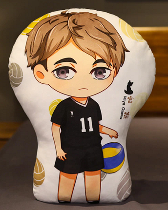 A young man with short light brown hair in a messy undercut, with grey eyes and a disinterested expression. He is wearing a black volleyball uniform with the number 11, and dribbling a volleyball.