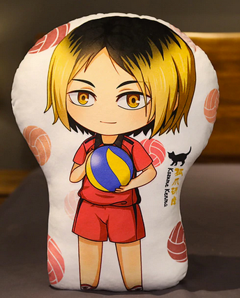 A smiling young man with chinlength blond hair that has prominent dark roots, and amber eyes. He is wearing a red uniform with the number covered as he holds a volleyball in front of his chest.