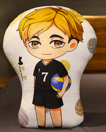 A smiling young man with earlength dyed blond hair, the undercut of which is dark brown. His uniform is black with a white number 7, and he has a volleyball tucked under his arm.