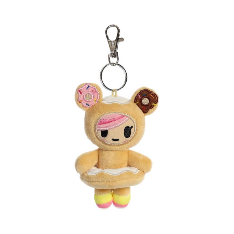 A keychain featuring a plush teddy bear-shaped humanoid with pink hair. Their 'ears' are pink and brown iced doughnuts, and they have a white iced doughnut worn around their middle like an inner tube. 