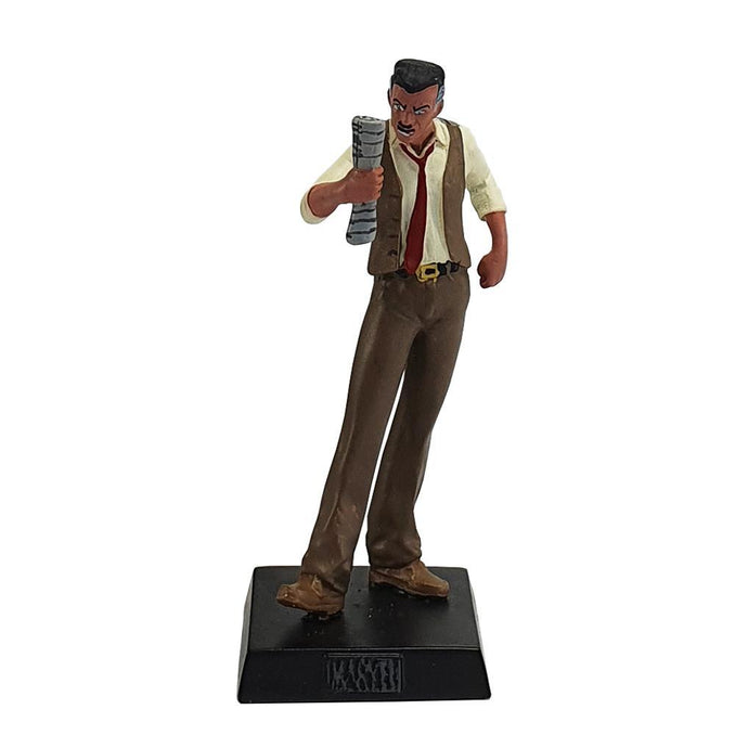 A lead-painted figure of J Jonah Jameson from Spider-Man. He grips a rolled up newspaper in his hand.